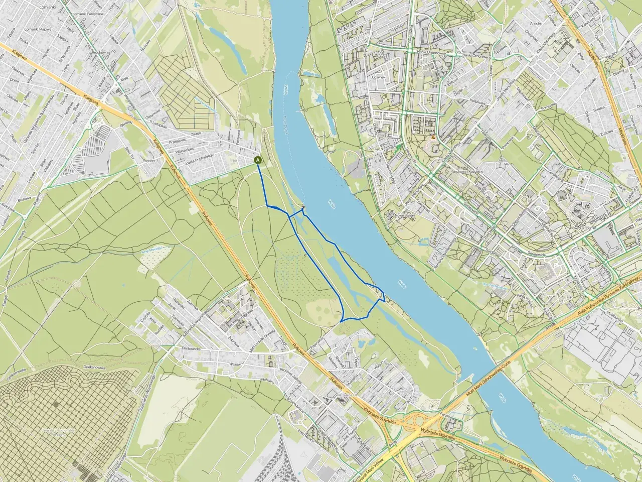 Trasa spacerowa wzdłuż Wisły w Tarchominie, Warszawa, z widokiem na most i tereny zielone.